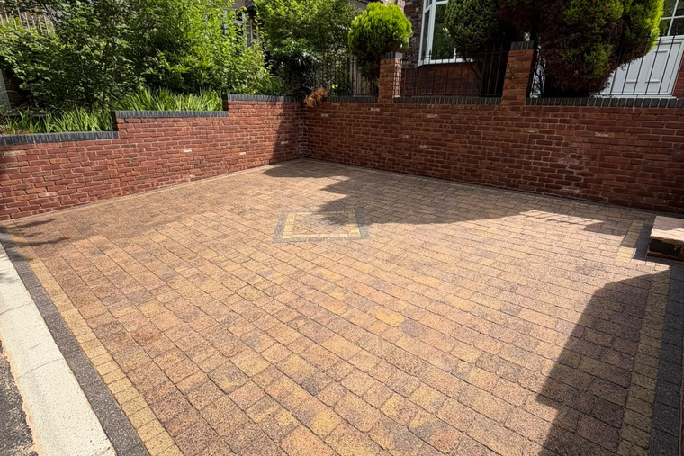 Pressure washed driveway and paving