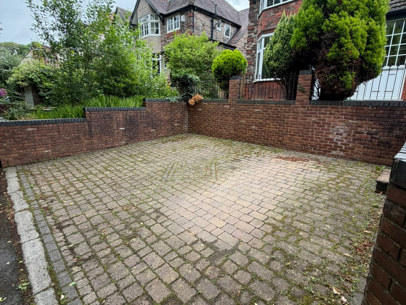 Paving before pressure washing